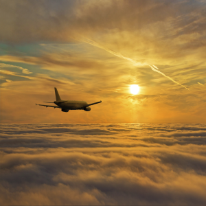 plane above clouds 300